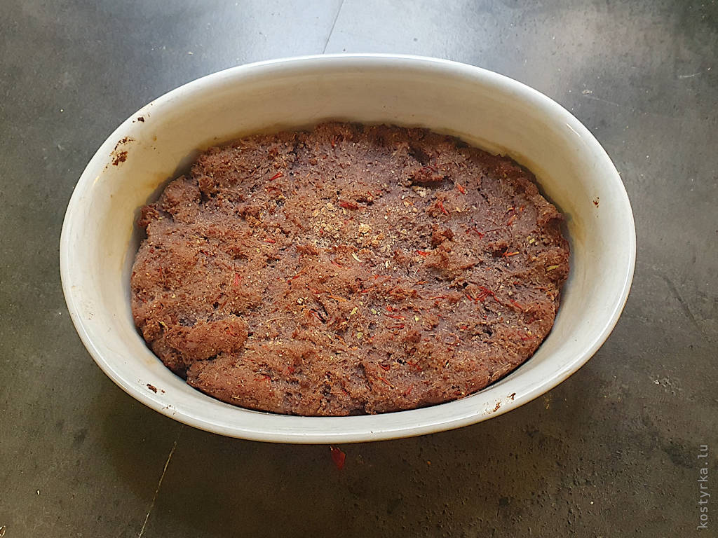 Freshly baked cardamom cake in a mould