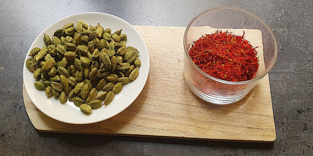 Cardamom pods before grinding and safflower